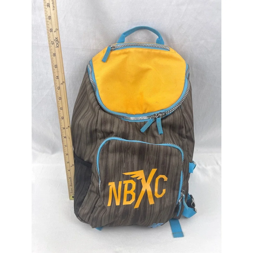 New Balance NBXC Cross Country‎ Podiuim Backpack Bag Yellow Blue Brown
